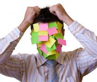 Confused man with post it notes